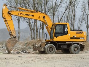 Pelle sur pneus multifonction d'origine d'occasion Hyundai 210W-7 Pelle KomatsuCATShyundai à haut rendement en bon état en vente - Product Image 2