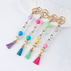 Nouvel Arrivage Porte-clés avec Mots Inspirants, Breloque de Sac à Pompon Perlé Coloré, Ornement Clé Tendance FAITH/HOPE/BLESSED/LOVE - Product Image 1