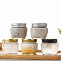 Vente en gros 30ml mini pot de miel en verre rond avec louche logo personnalisé vide pour le stockage de sucre miel confiture