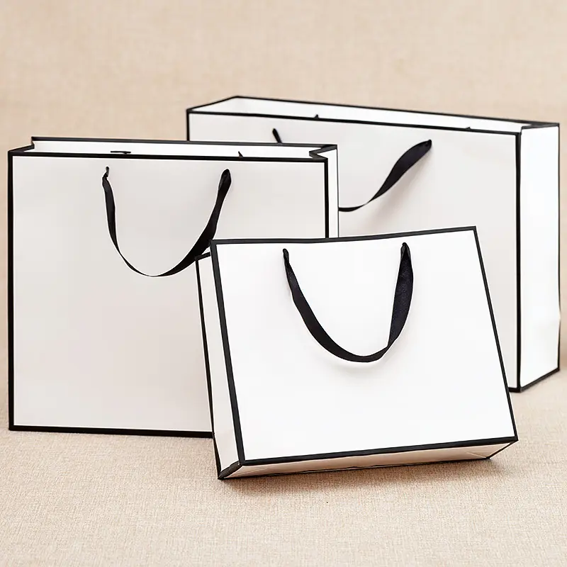 Bolsa de regalo de papel de lujo con logotipo personalizado, embalaje de boutique, de compras con logotipos