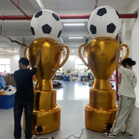Trophée gonflable géant avec coupe de championnat de football ou de soccer pour la publicité sur le thème du sport et autres événements