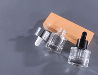 En stock, flacon de sérum en verre vide 30ml/50ml, bouchon compte-gouttes en caoutchouc, impression sur écran, emballage en carton pour sérum de soin de la peau, huile essentielle