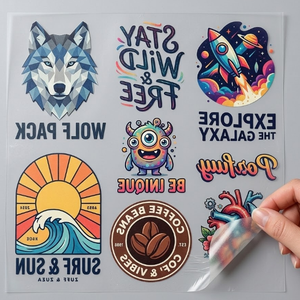 Diseños de Plastisol de Dibujos Animados en Goma/PET Personalizados, Adhesivos Serigrafiados, Logotipo en Vinilo Termoadhesivo, Lámina de Transferencia Térmica Textil - Product Image 2