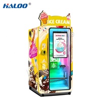 Distributeur automatique Haloo 24h/24 de yaourts et glaces molles avec système de paiement par pièces, code QR et jetons