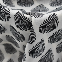 Tissu en mousseline de soie de haute qualité 75d * 75d motif de feuille de plante noir et blanc imprimé tissu en mousseline de soie pour vêtements pour femmes