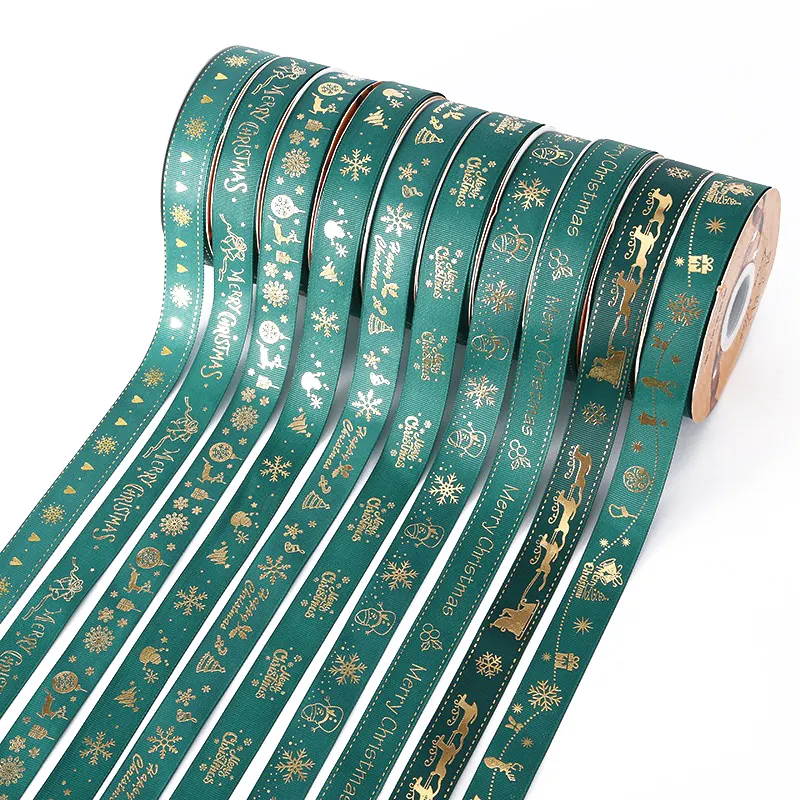Toptan fabrikadan kişiselleştirilmiş Logo altın folyo baskı 25mm Polyester şerit hediye noel ağacı için saten kurdele