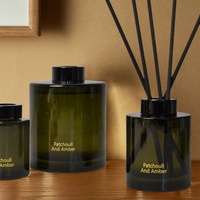 Diffuseur de parfum de luxe en verre 100ml 150ml 200ml 500ml en gros avec couvercle doré à vis et bâtonnets