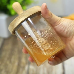 Supporto in vetro per vaso di miele moderno all'ingrosso con bastoncino di mestolo in legno e coperchio in legno per barattolo di miele in vetro da cucina di casa - Product Image 4