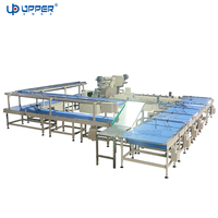 Ligne d'emballage automatique haute vitesse 2-en-1 pour biscuits avec unité d'alimentation et cadre arrière pour l'emballage alimentaire