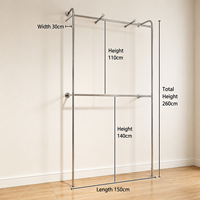 Portant à vêtements moderne en acier inoxydable autoportant avec étagères et double tringle pour boutique de vêtements et showroom