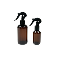Flacon pompe en plastique PET rond transparent brun ambré de 100 ml, 200 ml, 250 ml pour liquide de parfum avec pulvérisateur à gâchette noir