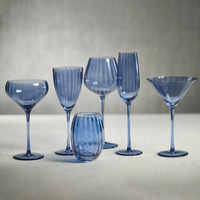 Collection de verrerie optique : Verres à vin, coupes à champagne et coupes à martini en cristal rose, gris, bleu et transparent, à long pied, en promotion