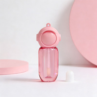 Mini contenants roses personnalisés avec logo du fabricant, tubes à gloss à lèvres vides en forme de robot mignon