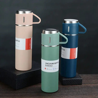 Bouteille isotherme à double paroi en acier inoxydable 304, faible MOQ usine, avec deux couvercles, ensemble cadeau