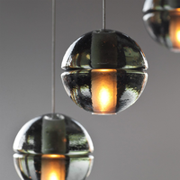 Lustre LED moderne en verre ovale sur base carrée en acier inoxydable, suspension spirale de luxe pour villa et hall d'hôtel