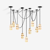 Lustre en acier noir personnalisé avec chaîne, lampe suspendue pour plafond haut, hôtel, villa, multi-lumières
