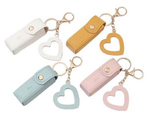 Llavero de piel sintética con forma de cubo para bálsamo labial y protector labial, estuche de viaje con espejo - Product Image 1