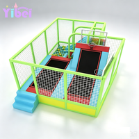 Parc de trampolines intérieur commercial Yibei pour enfants avec fosse à balles et panier de basket