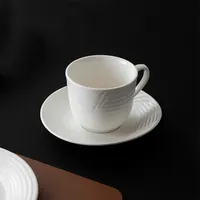 Semplice ristorante dell'hotel in ceramica Cappuccino Latte caffè bianco inglese Espresso tazze da tè e piattini