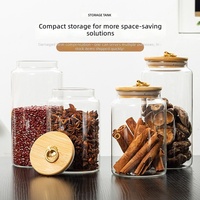 Vente en gros de nouveaux pots de conservation en verre de qualité alimentaire de style chinois avec couvercle en bois hermétique et résistant à l'humidité, couvercles en bambou pour le thé et les pelures de mandarine