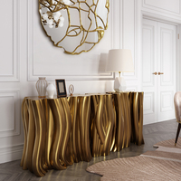 Table console au design courbé, finition brillante, monochrome, dorée, avant-gardiste, pour salon ou couloir