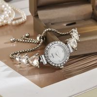 Montre à quartz minimaliste chic et preppy, style Instagram, incrustée de diamants multicolores en forme de cœur, nouvelle collection transfrontalière