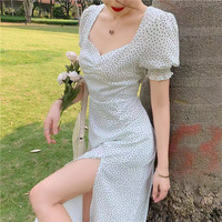 Robe d'été style français vintage amincissante mi-mollet à manches bouffantes à pois