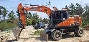 Excavatrices sur pneus Doosan DH140 DX140 d'occasion de bonne qualité, excavatrices coréennes Doosan d'occasion, pelle de 14 tonnes certifiée CE avec brise-roche - Product Image 6