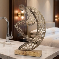 Sculpture abstraite en métal creux représentant une figure humaine, bronze foncé/bronze doré, base en marbre, statue de femme moderne de luxe, statue de femme réfléchissante