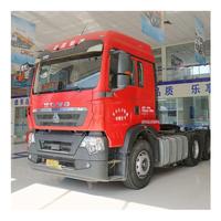 Truk Traktor Sinotruck Howo Laris Manis 410HP 6x4 Euro 2 LHD Diesel Baru dengan Kamera Belakang dan Layar Sentuh