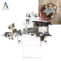 Machine à emballer le chocolat pour les petites pièces d'or en forme de ronde et de boule couvrant et moletant la machine d'emballage pour les pièces de chocolat