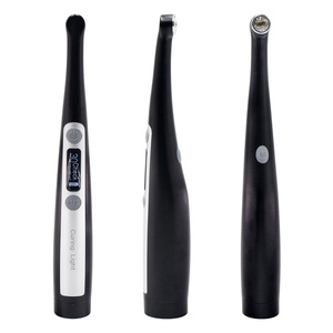 La <span class=keywords><strong>lampe</strong></span> de durcissement en résine de lumière de polymérisation dentaire de dauphin noir tourne <span class=keywords><strong>à</strong></span> 360 ° la <span class=keywords><strong>lampe</strong></span> de photopolymérisation dentaire Resina <span class=keywords><strong>lampe</strong></span> UV <span class=keywords><strong>lampe</strong></span> de dentisterie - Product Image 5