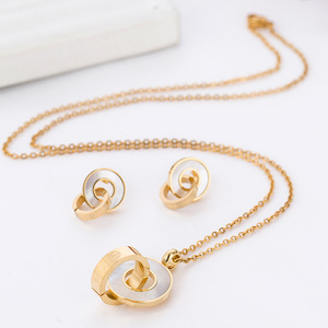 Ensemble collier et boucles d'oreilles en acier inoxydable plaqué or 18 carats avec pendentif double anneau en forme de coquille pour femme, bijoux géométriques ronds tendance - Product Image 2