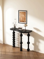 Table console noire moderne et courbée, table d'entrée étroite avec pieds en forme de bulle pour la décoration du salon à la maison