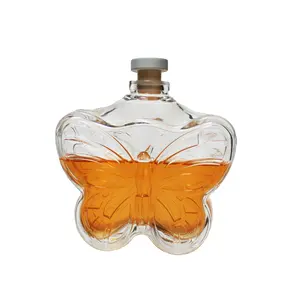 Forma personalizada forma de mariposa diseño único whisky brandy gin licor botella de vidrio con corcho de aluminio