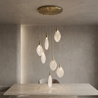 Suspension Jingshi Lighting Goutte d'Or, abat-jour en forme de larme blanc laiteux sur fils fins, luminaire de plafond pour la maison à l'éclat chaleureux