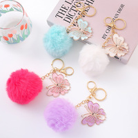 Porte-clés pompon papillon, breloque boule moelleuse, pendentif de sac, mignon Kawaii, vente en gros, personnalisé OEM ODM