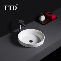Vasque de salle de bain moderne en céramique ronde à poser sur comptoir, avec options style ferme et salle à manger, en porcelaine haut de gamme pour usage hôtelier