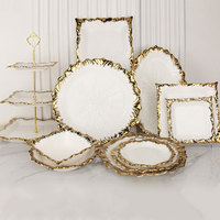 Ensemble d'assiettes à dîner rondes en céramique de luxe moderne avec bord doré, vaisselle en porcelaine écologique pour les fêtes, vente en gros
