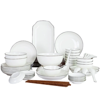 Vaisselle de ménage Vaisselle de restaurant en porcelaine à bord noir Bol en céramique pour soupe blanche de riz européen au micro-ondes