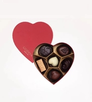 Boîte de luxe haut de gamme en forme de cœur à la truffe au chocolat pour la Saint-Valentin emballée avec une belle boîte de chocolat en forme de cœur séparée