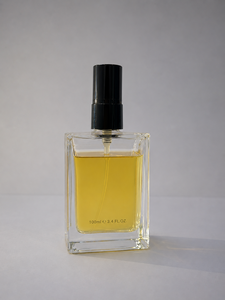 Perfume Unisex Simple en Spray de 100 ml, Líquido Amarillo, Botella de Vidrio Transparente, Tapa Negra, Precio al por Mayor - Product Image 1