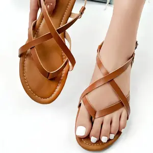 2023 new flat sandals hollow summer cross strap beach flat Roman women's shoes