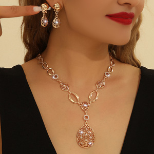 European and American Hot Sale Golden Bohemian Inlaid Rhinestone Hollow <b>Flower</b> Necklace Earrings Set Women Jewelry - Product Image 1