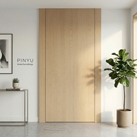 Armoire en bois massif avec cadre en laiton et verre cannelé vertical en noyer foncé, pour chambre, dressing, cuisine, ou comme porte intérieure de séparation.