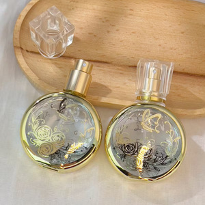 Botella de Perfume de Vidrio de Lujo de 25 ml con Estampado Dorado, Botella Atomizadora de Fragancia Recargable de Alta Gama con Cuello de Rosca - Product Image 1