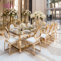 Table de banquet de mariage extérieure pour hôtel moderne et élégant, base en métal doré, plateau en verre miroir en acier inoxydable