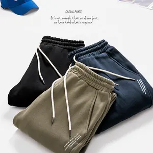 Fransız terry ter pantolon erkek gevşek OEM erkek spor pamuk özel rahat pantolon kadife joggers baskılı logo yığılmış Sweatpants