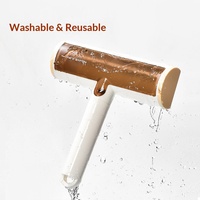 Éliminateur de poils d'animaux : Brosse adhésive statique pour éliminer les poils de chat et autres poils, un outil indispensable pour l'élimination des poils