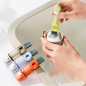 Petite brosse en silicone en forme de crocodile 4 en 1 multifonctionnelle pour le nettoyage des biberons, des couvercles et des tétines, avec un bord en U - Product Image 2